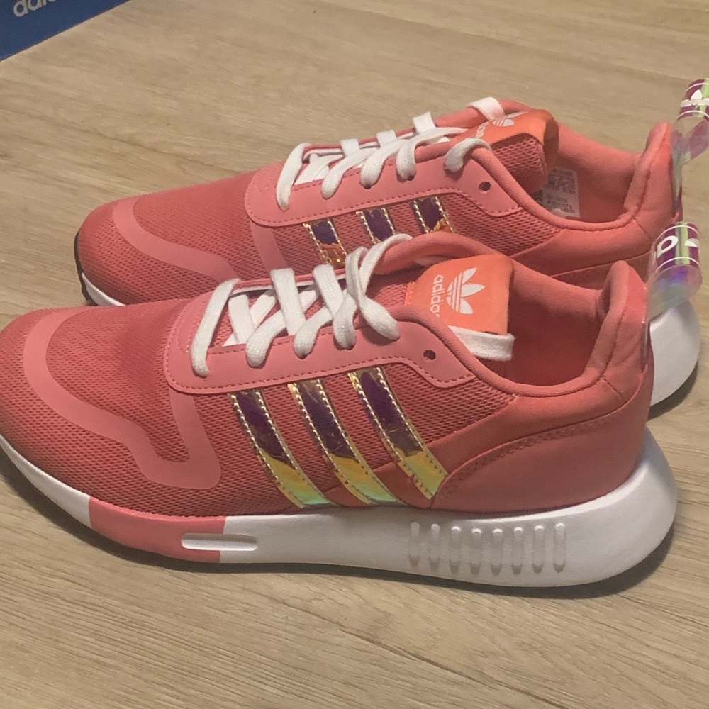 Brand new Adidas. Purchased from Macys. Comes with or without box. Never worn